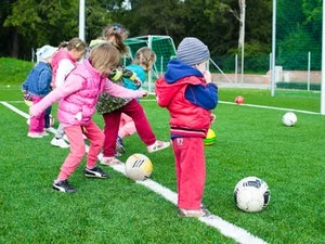 montessori children playing football