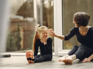 mother daughter exercise at home